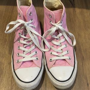Women’s pink high top All Star. Worn a few times.  Good clean condition